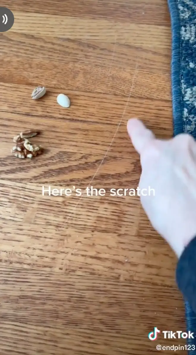 A woman used a walnut to get rid of the scratch in her floor