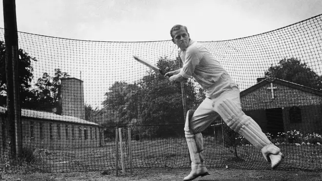 Prince Philip plays cricket in July 1947
