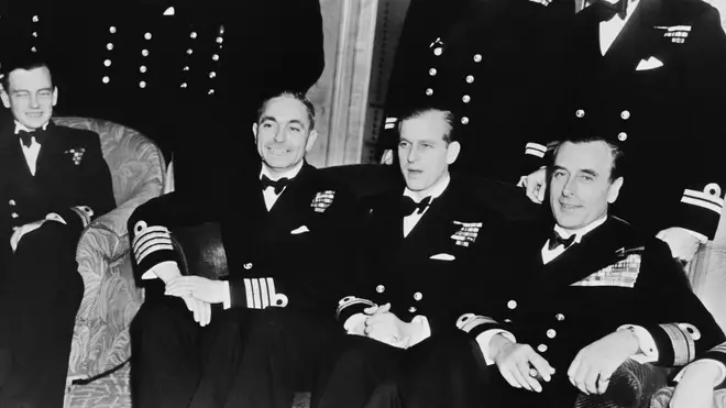 Prince Philip poses with fellow Navy Officers at his stag party on November 19 1947. The event took place at the Dorchester Hotel in London.