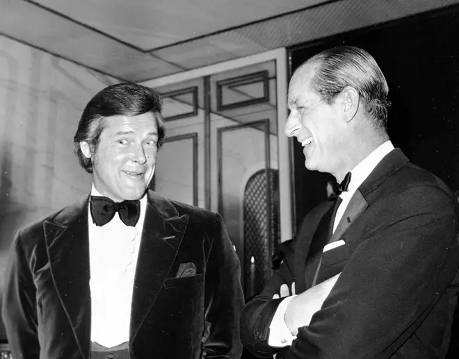 Prince Philip with actor Roger Moore at an auction dinner in aid of the Variety Club of Great Britain, at the Savoy Hotel, London.