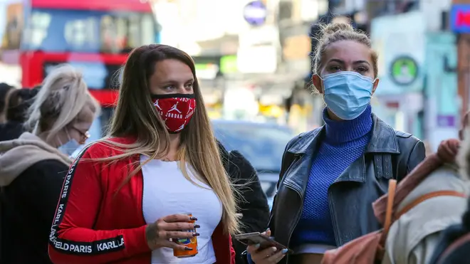 Face masks in England could remain for 'some time'