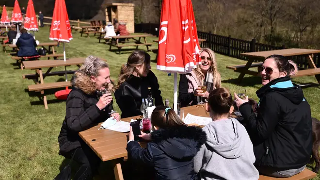 People in England flocked to pub gardens yesterday