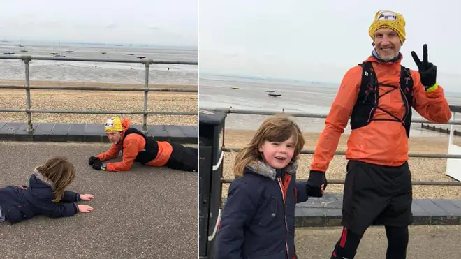 A  man has been hailed as a 'hero' after he lay down on the pavement to help an autistic boy