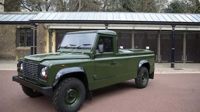 The car is a modified Land Rover Defender TD5 130 chassis cab vehicle