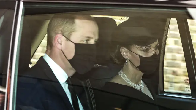 Kate and William wear face masks as they arrive for the service