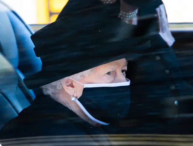 The Queen pictured in the back of the Royal Bentley travelling to her husband's funeral