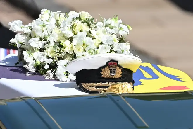Prince Philip's Admiral of the Fleet naval cap sits on top of the coffin