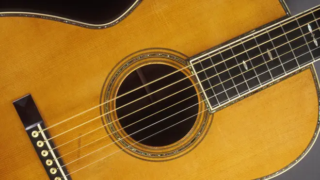 A man's guitar was broken by his three year old child
