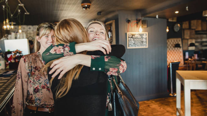 Hugging with those outside your support bubble will be allowed from May 17 (stock image)