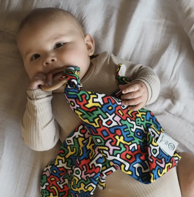The baby sensory range features two of Keith Haring's most iconic prints