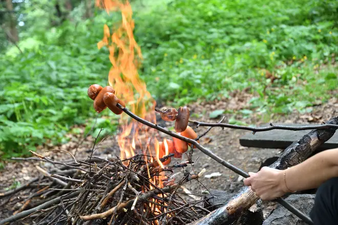 Slovakian people love cooking sausages over an open fire
