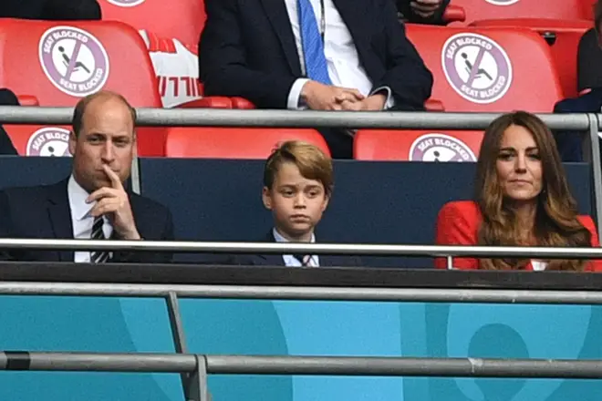 Prince George dressed in a suit and tie for the England versus Germany game