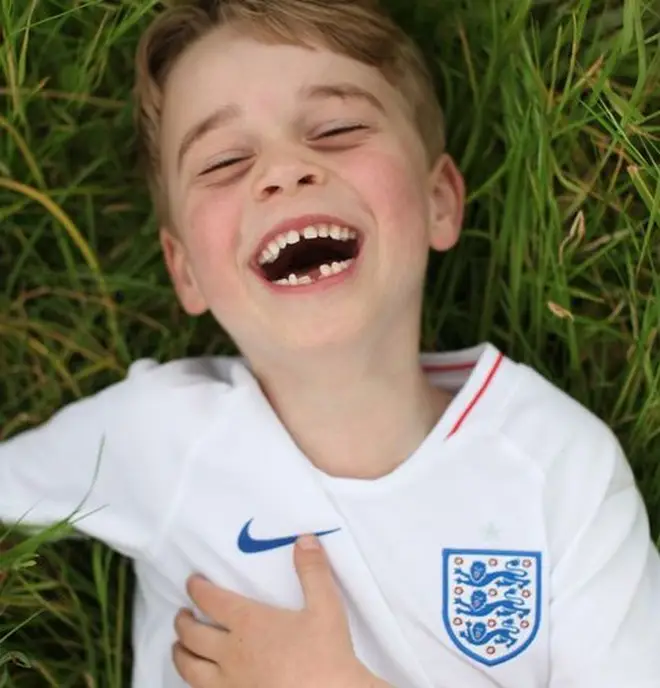 Prince George has previously been pictured showing his love for the England football squad