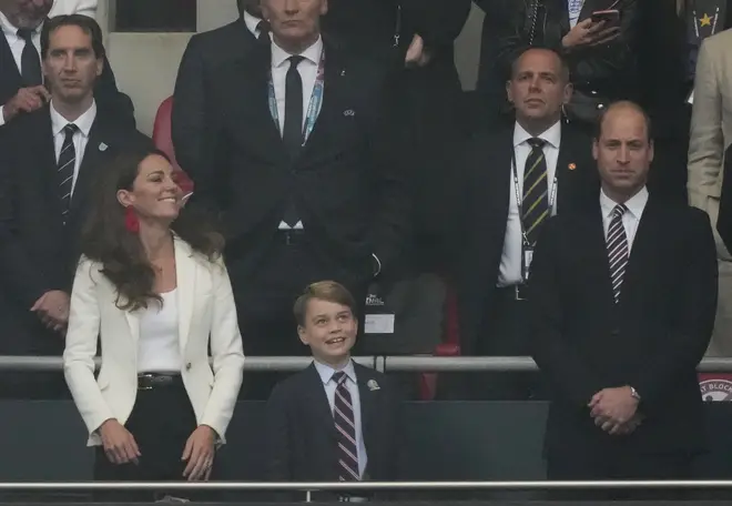 Prince George was seen in good spirits at the start of the match