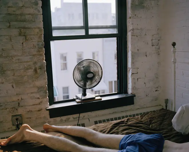 Many of us sleep with our fans pointing towards us (stock image)