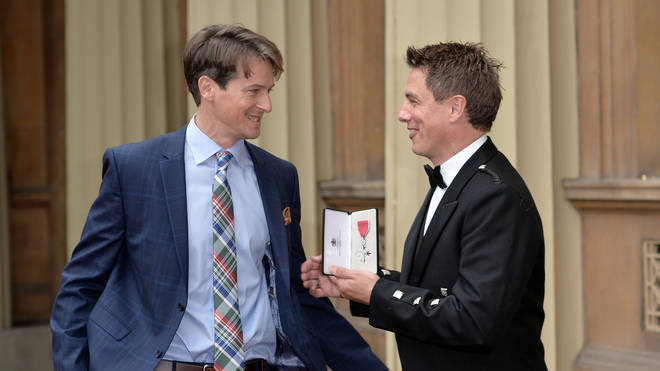 Scott Gill and John Barrowman at Buckingham Palace after he was awarded an MBE