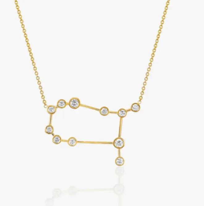 The necklaces are the star constellations for Gemini and Taurus, her children's star signs