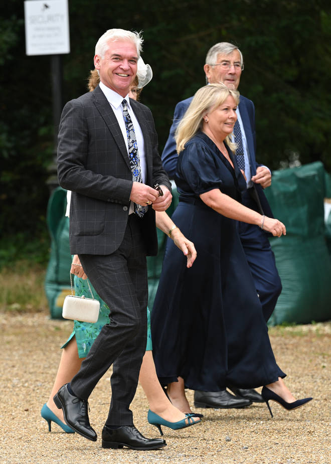 This Morning host Phillip Schofield arrives at the Hampshire church with his estranged wife Steph