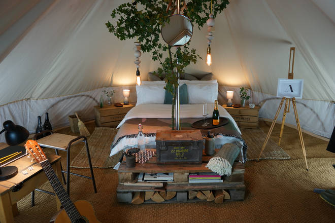 The bell tents come with a double bed, fresh linen, bathrobes, towels and art material