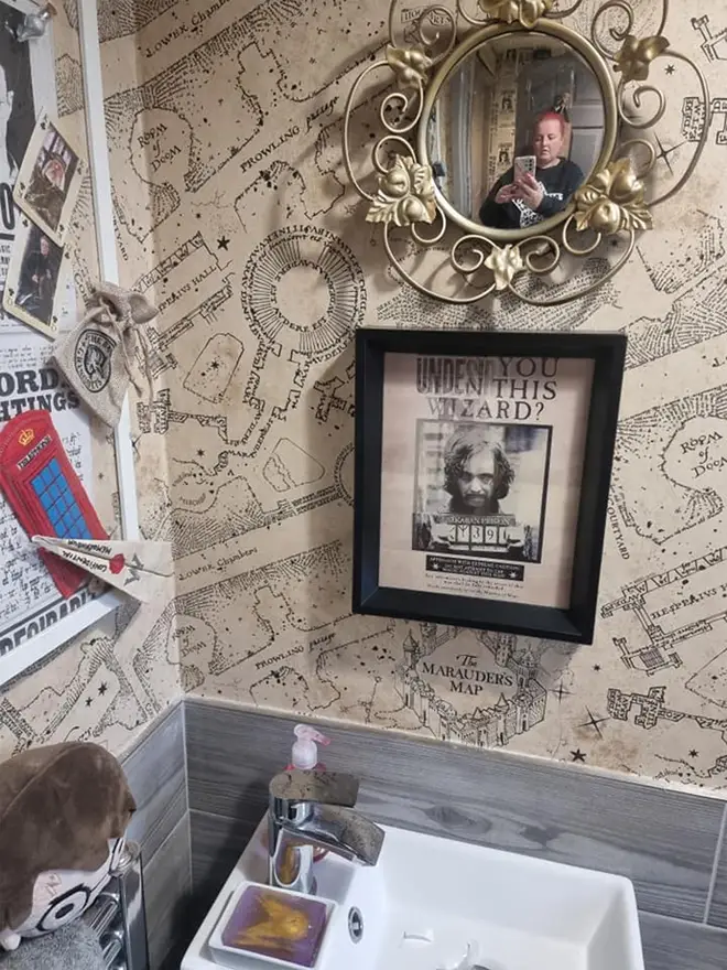 The bathroom features posted from the films