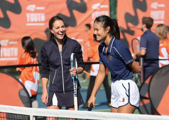The pair were all smiles during the friendly game