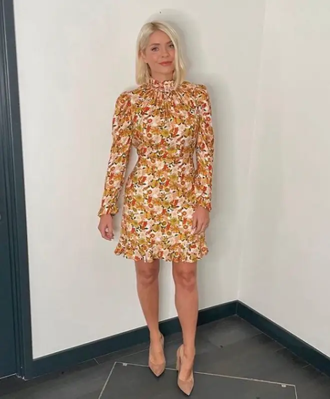 Holly Willoughby is wearing a yellow patterned mini dress on This Morning