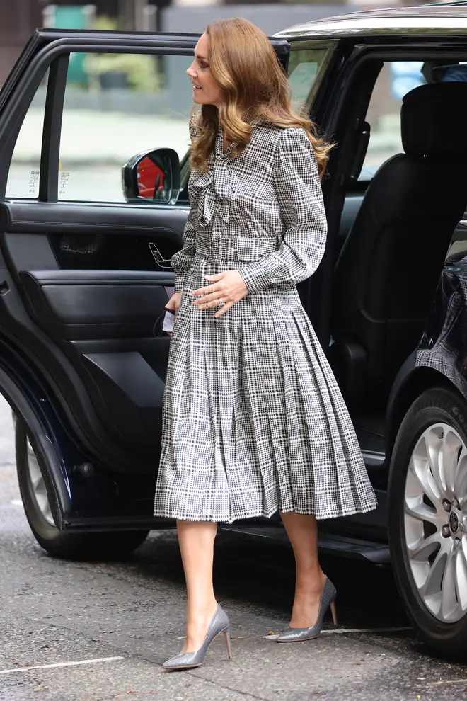The Duchess of Cambridge teamed a checked dress with grey stilettos for the event in London