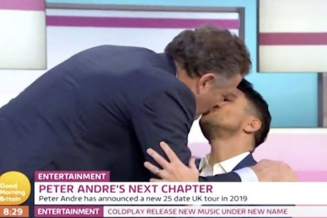 Piers Morgan and Peter Andre kiss
