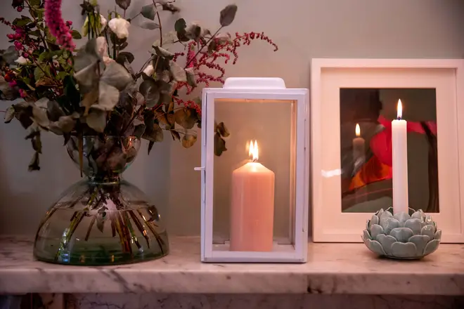 A simple lantern or delicate candle holder can make a big impact