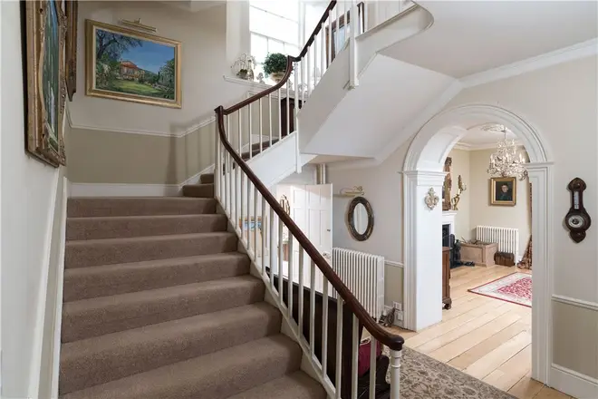 The property features a grand staircase