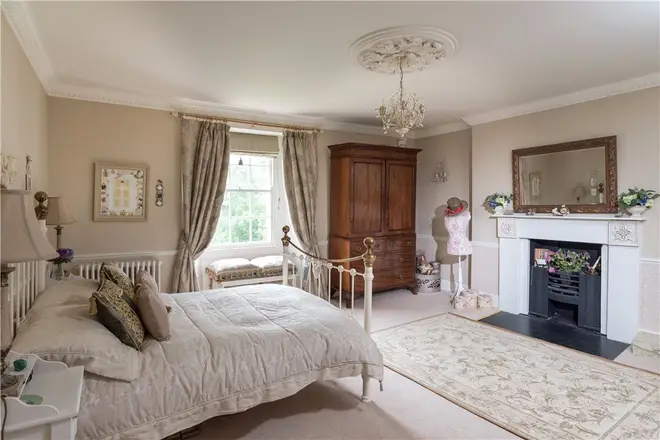 The bedrooms feature antique dressings