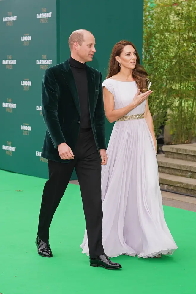 They were photographed walking the green carpet together