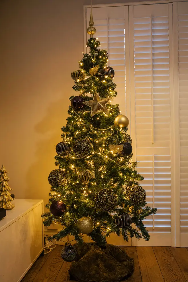 Using a variety of baubles in similar and complementary colours made the tree look very luxurious