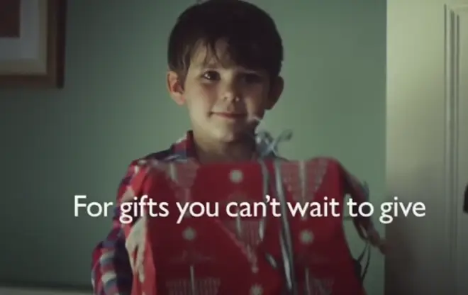 The advert starred Lewis as a little boy impatiently waiting for Christmas day so he could give his parents their gift