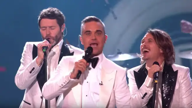 Robbie Williams joined Take That up on stage at the X Factor final