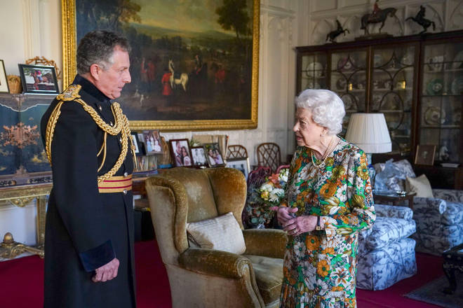 Her Majesty could be seeing reaching for her wedding ring at the mention of Lord Mountbatten