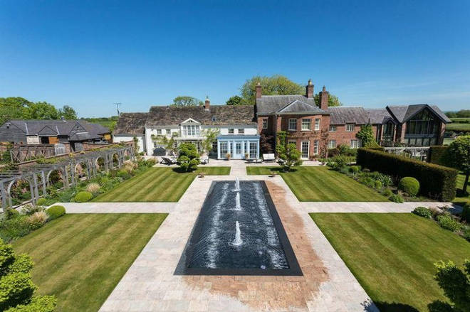 This Knutsford home comes with a water feature