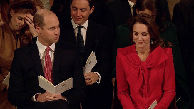 The Duchess of Cambridge can be seen smirking after sharing a flirtatious moment with her husband