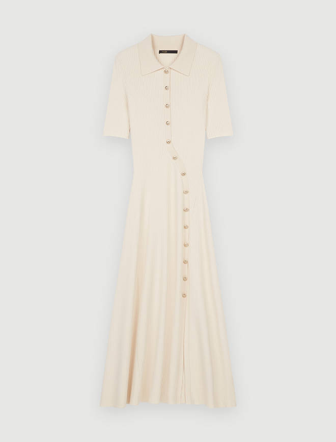 Holly Willoughby is wearing a cream midi dress from Maje