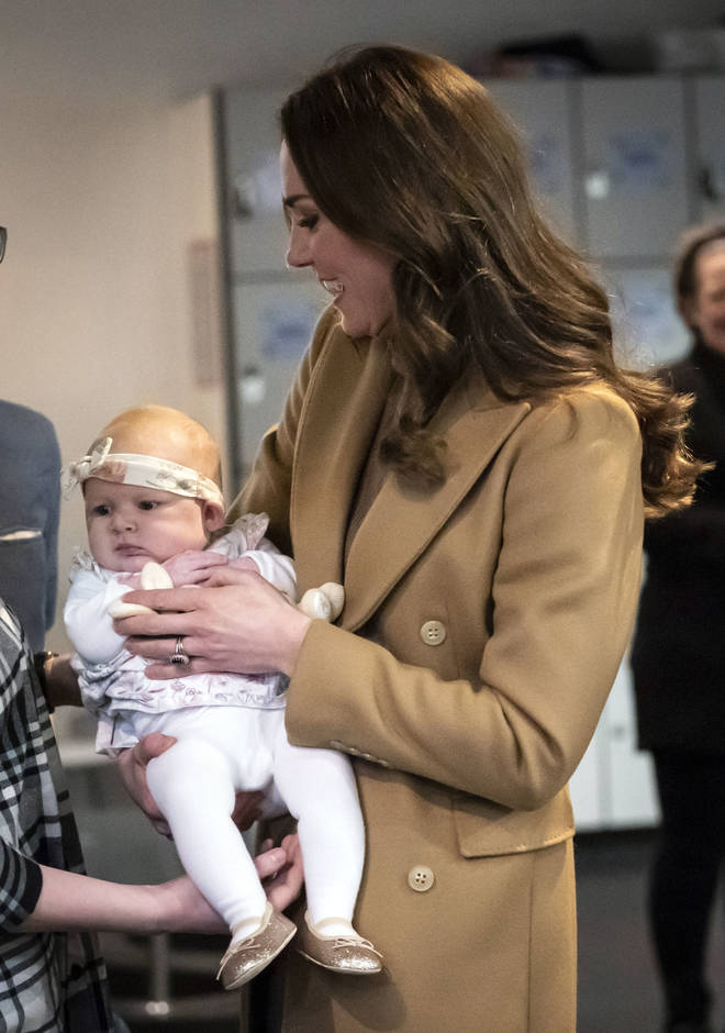 Prince William told the couple 'not to give her more ideas' as Kate Middleton held the baby