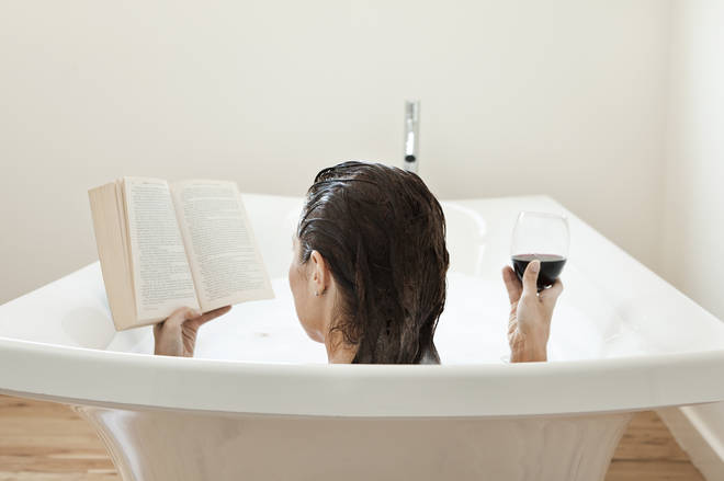 An expert has explained why it may be a bad idea to drink wine in the bath (stock image)