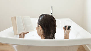 An expert has explained why it may be a bad idea to drink wine in the bath (stock image)
