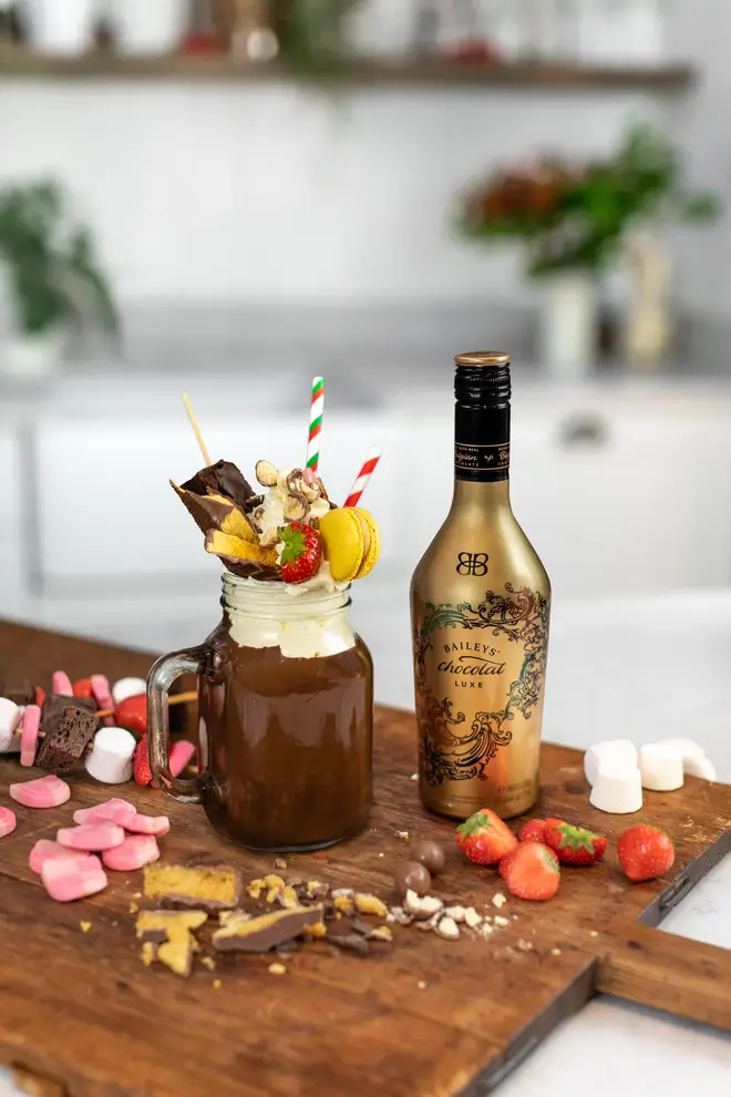 This boozy hot chocolate comes complete with fruit kebabs