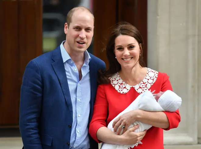 The Duke and Duchess of Cambridge smile with newborn Prince Louis