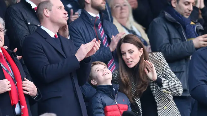 Prince George beamed with happiness as he watched the game