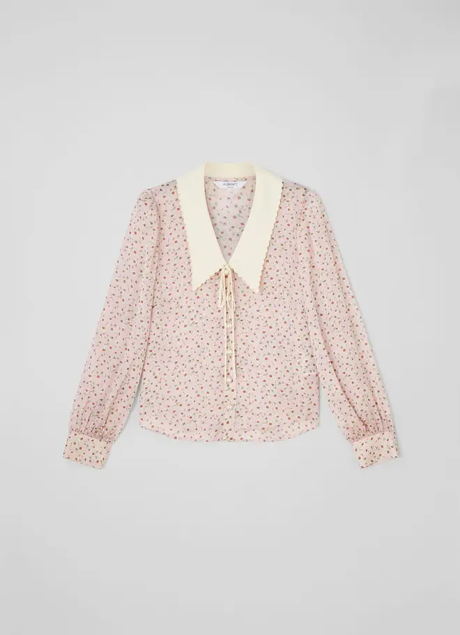 Holly Willoughby is wearing a pink blouse from LK Bennett