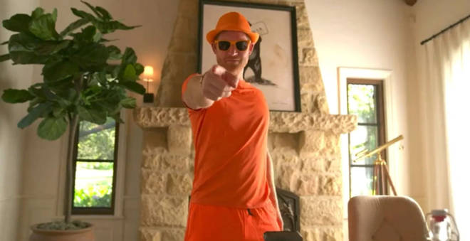 Prince Harry donned an all-orange outfit at the end of the video