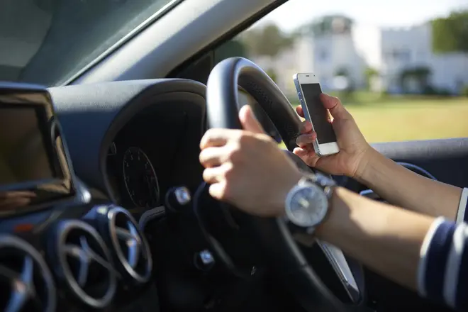 You could be fined up to £1,000 for using your phone at the wheel
