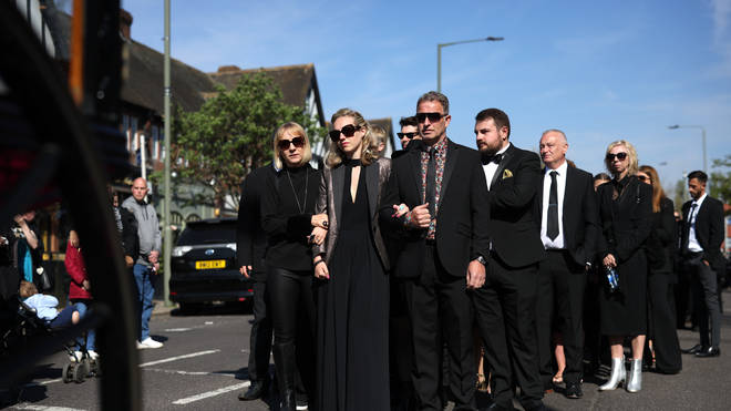 Tom Parker's wife Kelsey is leading the procession