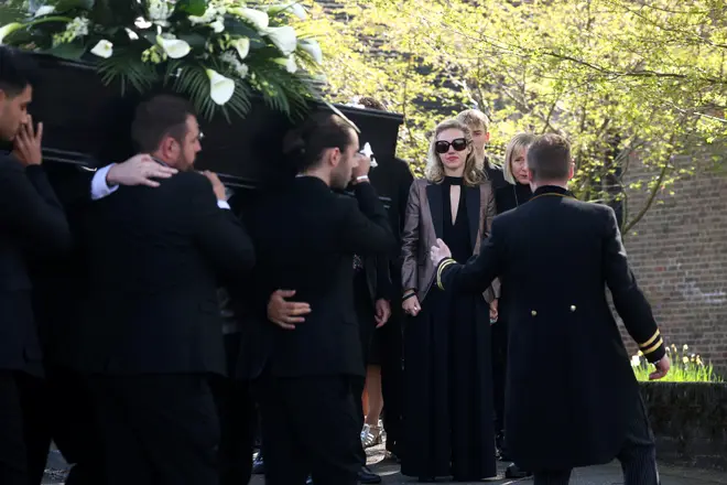 Kelsey Parker watched as Max George, Jay McGuiness, Siva Kaneswaran and Nathan Sykes carried Tom's coffin into the church